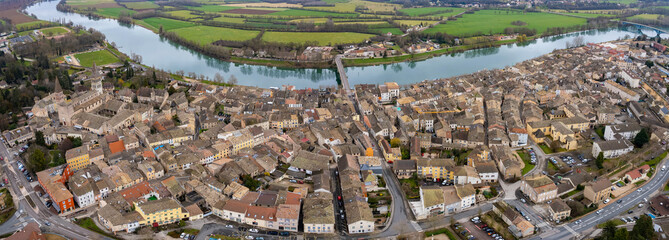 An aerial panorama view around the old town in the city Tournus in France on a sunny morning in early spring