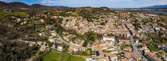 An aerial panorama view around the old town in the city Charmes-sur-Rhône in France on a sunny morning in early spring