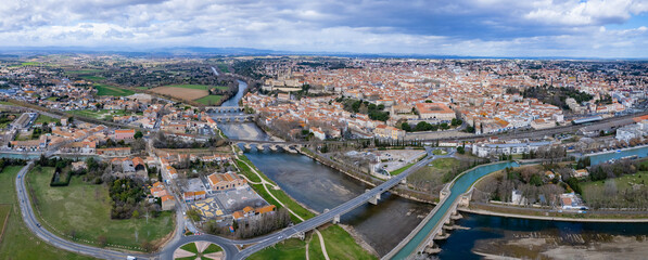 An aerial panorama view around the old town in the city Beziers in France on a sunny morning in early spring