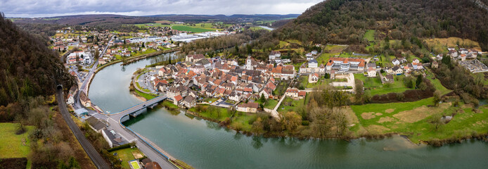 Aerial view of the old town of the city Pays-de-Clerval in France on a cloudy afternoon in early spring.