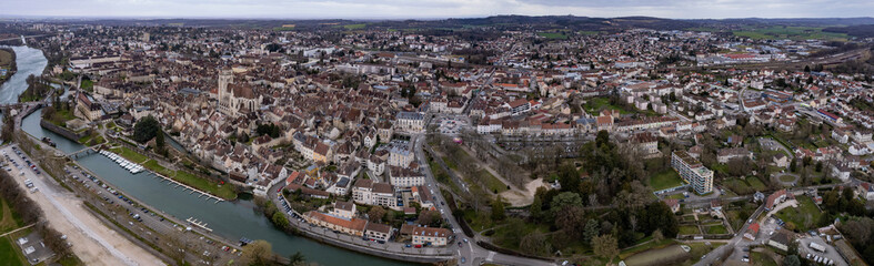 Aerial view of the old town of the city Dole in France on a cloudy afternoon in early spring.