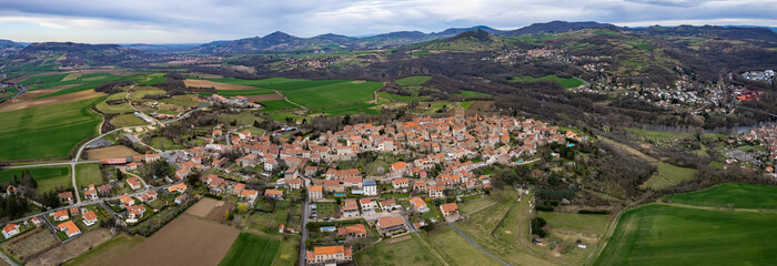 An aerial panorama view around the old town in the city Montpeyroux in France on a sunny morning in early spring