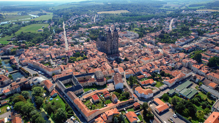 An aerial panorama view around the old town in the city Saint-Nicolas-de-Port in France on a sunny afternoon in early spring