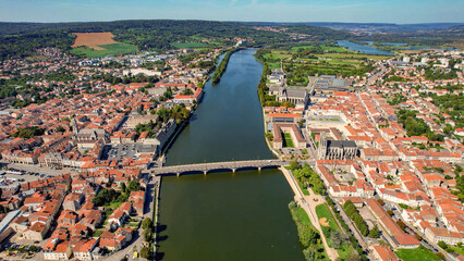 An aerial panorama view around the old town in the city Pont-à-Mousson in France on a sunny afternoon in early spring