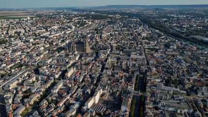 Aerial of the old town around the city Reims in France on a sunny day in late summer.
