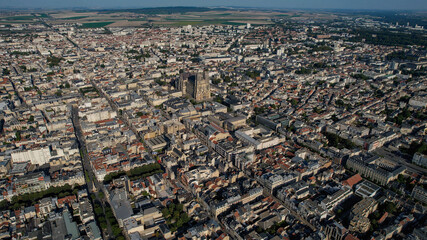 Aerial of the old town around the city Reims in France on a sunny day in late summer.