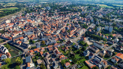 Aerial of the old town around the city Sarrebourg in France on a sunny day in late summer.