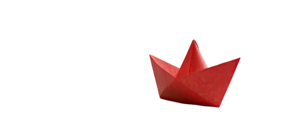 Red paper boat origami on black background