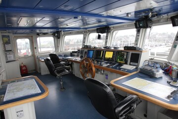 Interior view of a ship's navigation bridge.
