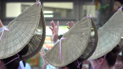 TOKYO, JAPAN - AUG 2025 : Awa Odori dance festival in Koenji. Powerful and energetic dance and music. Traditional Japanese summer event in Tokyo. Slow motion shot of dancer.