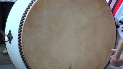 TOKYO, JAPAN - AUG 2025 : Slow motion shot of Awa Odori dance festival in Koenji. Powerful and energetic dance and music. Traditional Japanese summer event in Tokyo. Close up shot of drum.