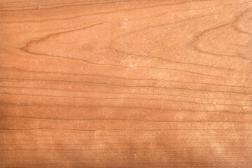 High resolution top view photo of natural moire cherry wood texture background grain texture, perfect for use as wallpaper, or design element.