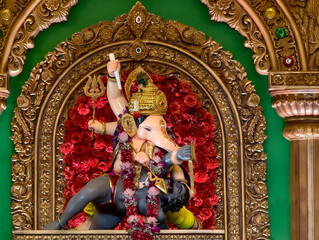 Fototapeta premium 27 August 2025, Pune, Maharashtra, India, Beautiful idol of Lord Ganesh installed by Bhausaheb Rangari Ganpati during Ganesh festival 2025.