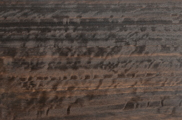 High resolution top view photo of natural smoked eucalyptus wood panel texture background grain texture, perfect for use as wallpaper, or design element.