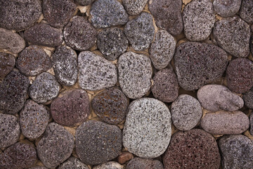 Natural Stone Wall Made of Rough Volcanic Rocks – Rustic Rock Texture Background