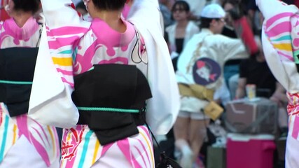 TOKYO, JAPAN - AUG 2025 : Awa Odori dance festival in Koenji. Powerful and energetic dance and music. Traditional Japanese summer event in Tokyo. Close up shot of dancer.