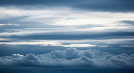 Fototapeta premium Serene layers of clouds in the sky displaying a captivating aerial scenery