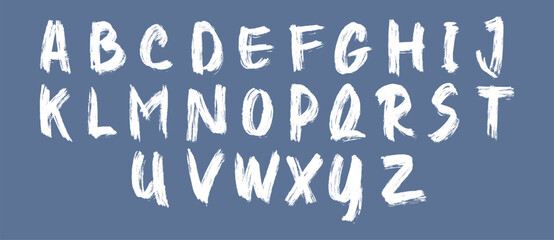 Hand drawn brush stroke alphabet letters in white on blue background. Artistic textured grunge font style for creative typography. Bold lettering design for posters and graphics.