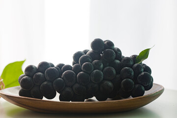 Bunch of organic black grapes.