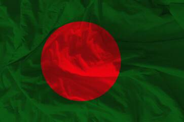 Stylized image of Bangladesh flag with crumpled paper texture and halftone effect. Concept of...