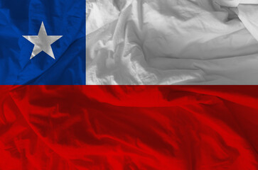 Stylized image of the Chilean flag with a crumpled paper texture and halftone effect. Concept of...