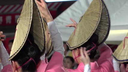 TOKYO, JAPAN - AUG 2025 : Awa Odori dance festival in Koenji. Powerful and energetic dance and music. Traditional Japanese summer event in Tokyo. Slow motion shot of dancer.