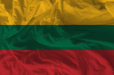 Stylized image of Lithuanian flag with crumpled paper texture and halftone effect. Concept of...