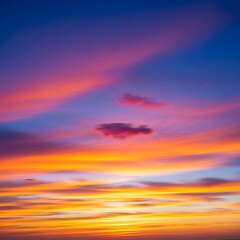 Obraz premium Colorful sunset sky with vibrant orange, blue, pink, and purple hues