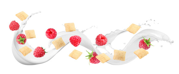 Splashing milk with sweet corn pads and fresh raspberries in air against white background. Healthy...