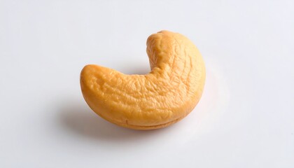 Single cashew nut on white background (1)