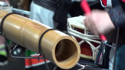 TOKYO, JAPAN - AUG 2025 : Slow motion shot of Awa Odori dance festival in Koenji. Powerful and energetic dance and music. Traditional Japanese summer event in Tokyo. Close up shot of drum.