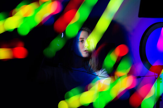 Blogger content creator using in hands mobile phone gadget. 
Woman blogger influencer creating vlog video for social media. - Powered by Adobe