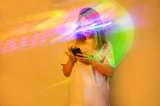 Interact with a computer generated environment and peoples in metaverse on smartphone. Concept of the metaverse on mobile gadget.