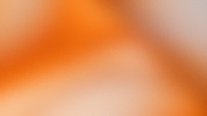 Abstract blurry orange and peach hues swirling with soft light and texture