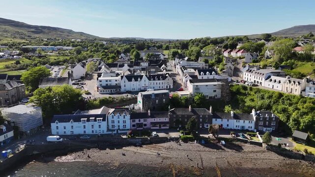 Drone footage of Portree town on Isle of Skye, Scotland, United Kingdom