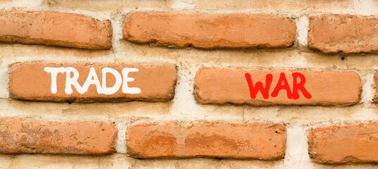 Trade war symbol. Concept word Trade war on beautiful old brown brick wall. Beautiful old brown...