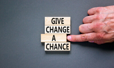 Give change a chance symbol. Concept words phrase Give change a chance on beautiful wooden blocks....