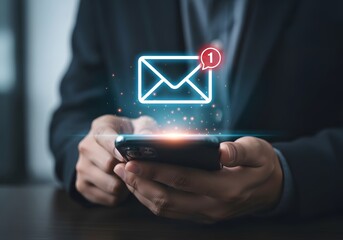 Man holding smartphone with glowing email notification icon above screen