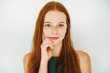 Pretty 18 years old blonde girl posing in studio