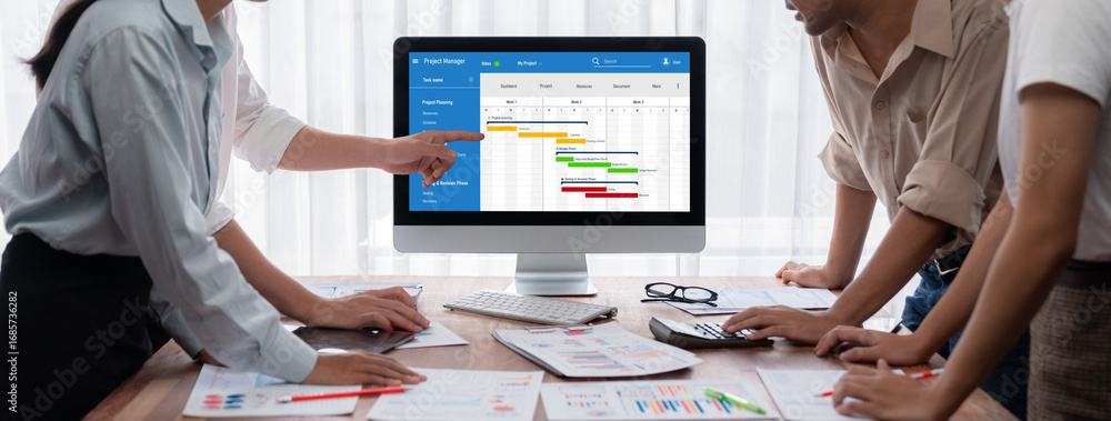 Poster project planning software for brisk business project management on the computer screen showing timel