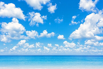 Obraz premium Bright blue sky with scattered fluffy white clouds over calm turquoise sea, clear horizon dividing water and sky
