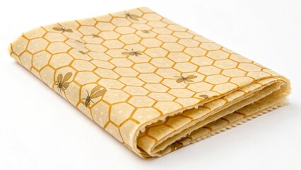 Beeswax food wrap with honeycomb pattern isolated on white background, a sustainable and ecofriendly alternative to plastic wrap for food storage
