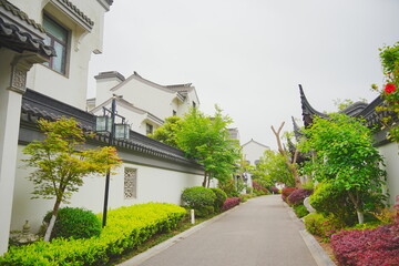 Nantong, Jiangsu, China: 04 21 2025: Beautiful Jiangsu traditional Chinese building, Roof, wall, tile and door