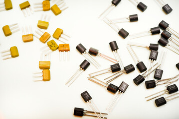 Obraz premium Bipolar transistors on a white background. Semiconductor devices. Microelectronics.