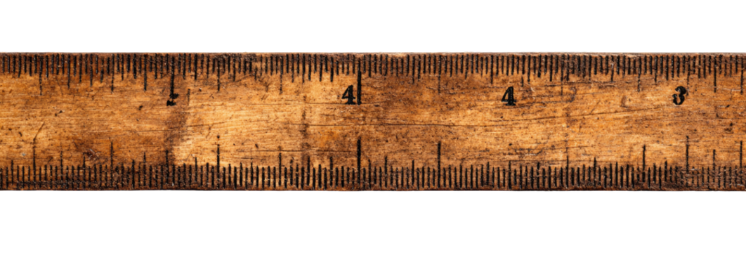 Aged wooden ruler with markings