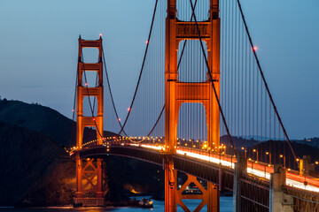 Traffic on Golden Gate bridge at night with long shutter speed, long exposure photography.