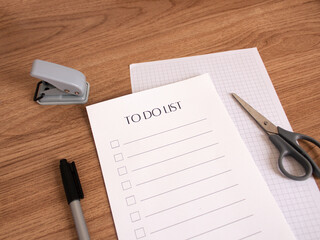 Office supplies on wooden desk. Organization and schedule concept. 
