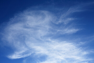 Obraz premium Backgrounds. Cloudscape. Deep blue sky with beautiful cirrus and cirrostratus clouds. Portugal. 