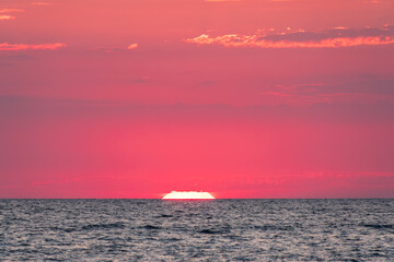 Beautiful red and orange sunrise over the sea.