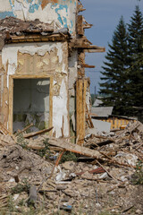 Destroyed private building. Consequences of the disaster.